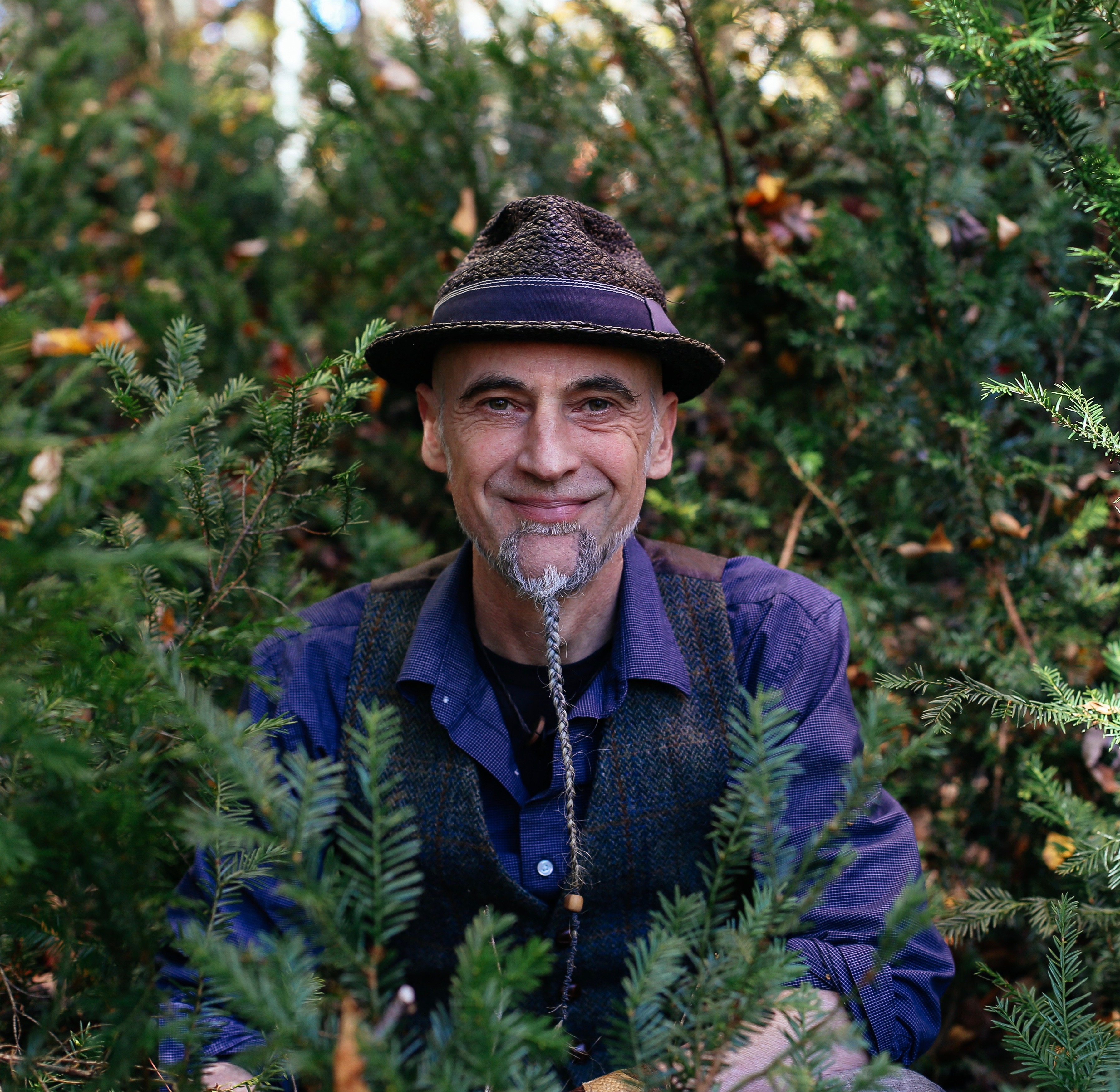photo of michael dunning standing amongst the trees